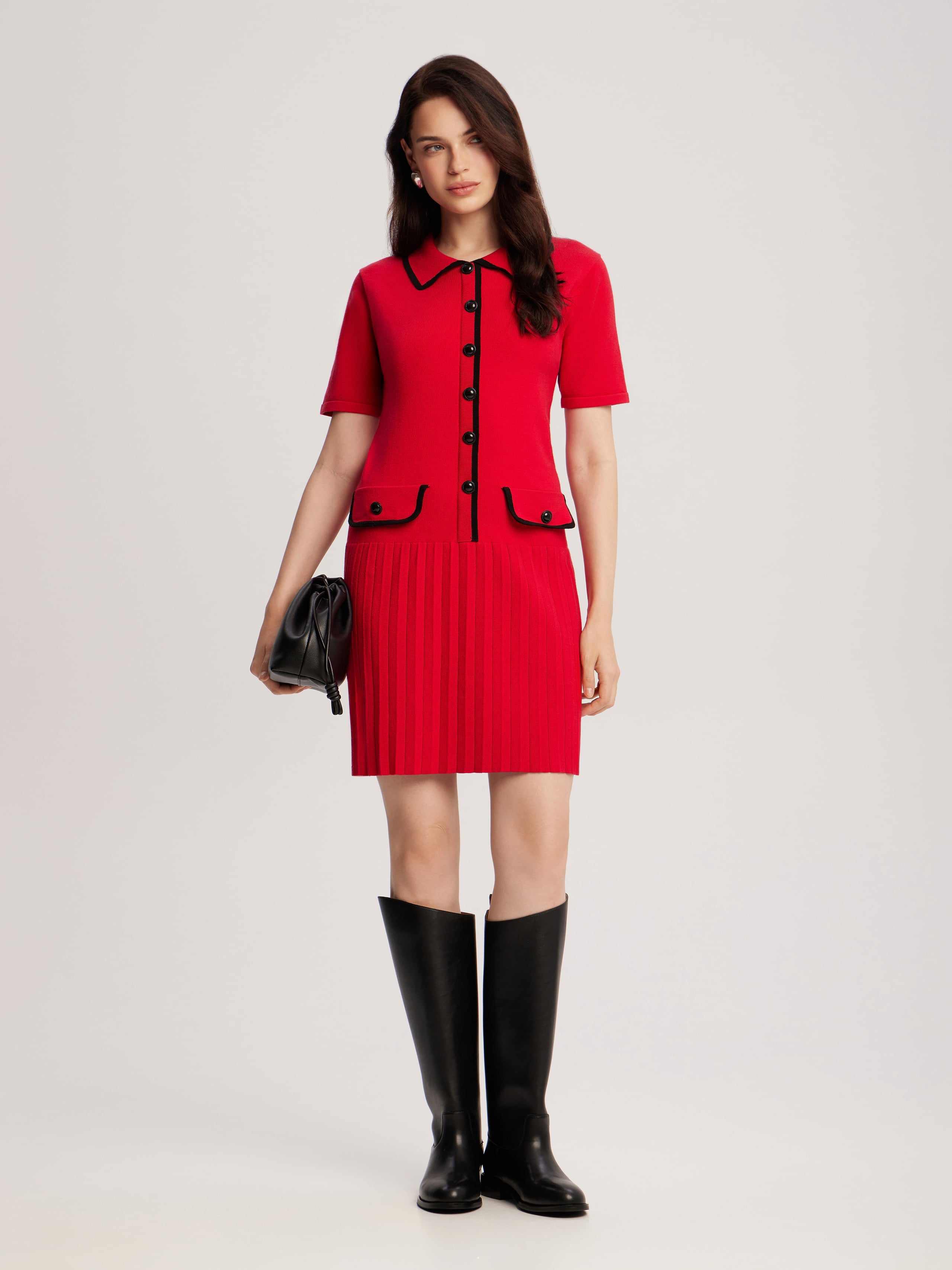 Dress with pleated hem