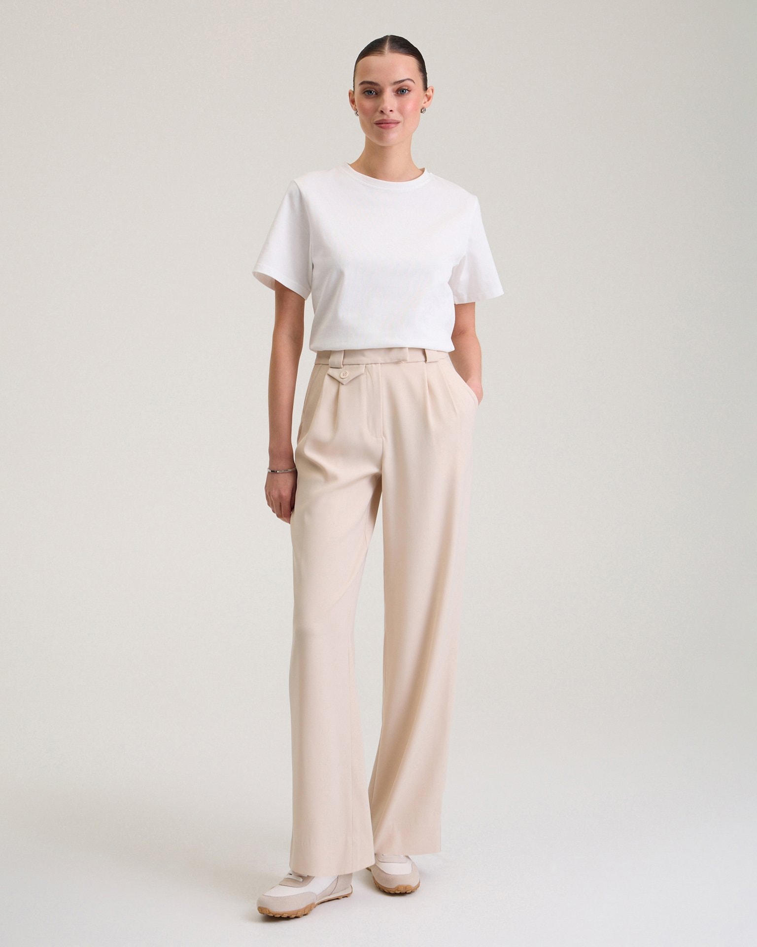 Trousers with a decorative pocket in beige, Beige — photo 4