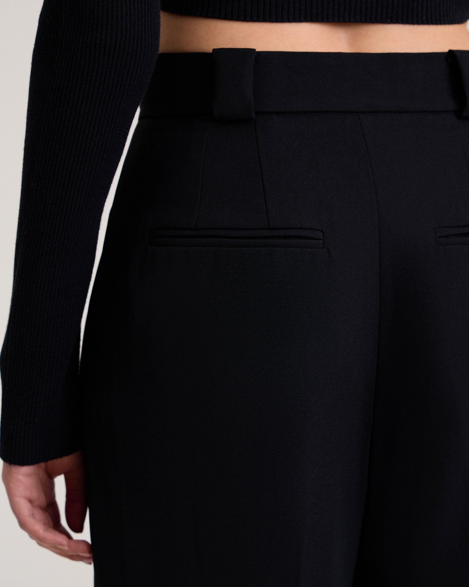 Trousers with decorative pocket in black, Black — photo 9
