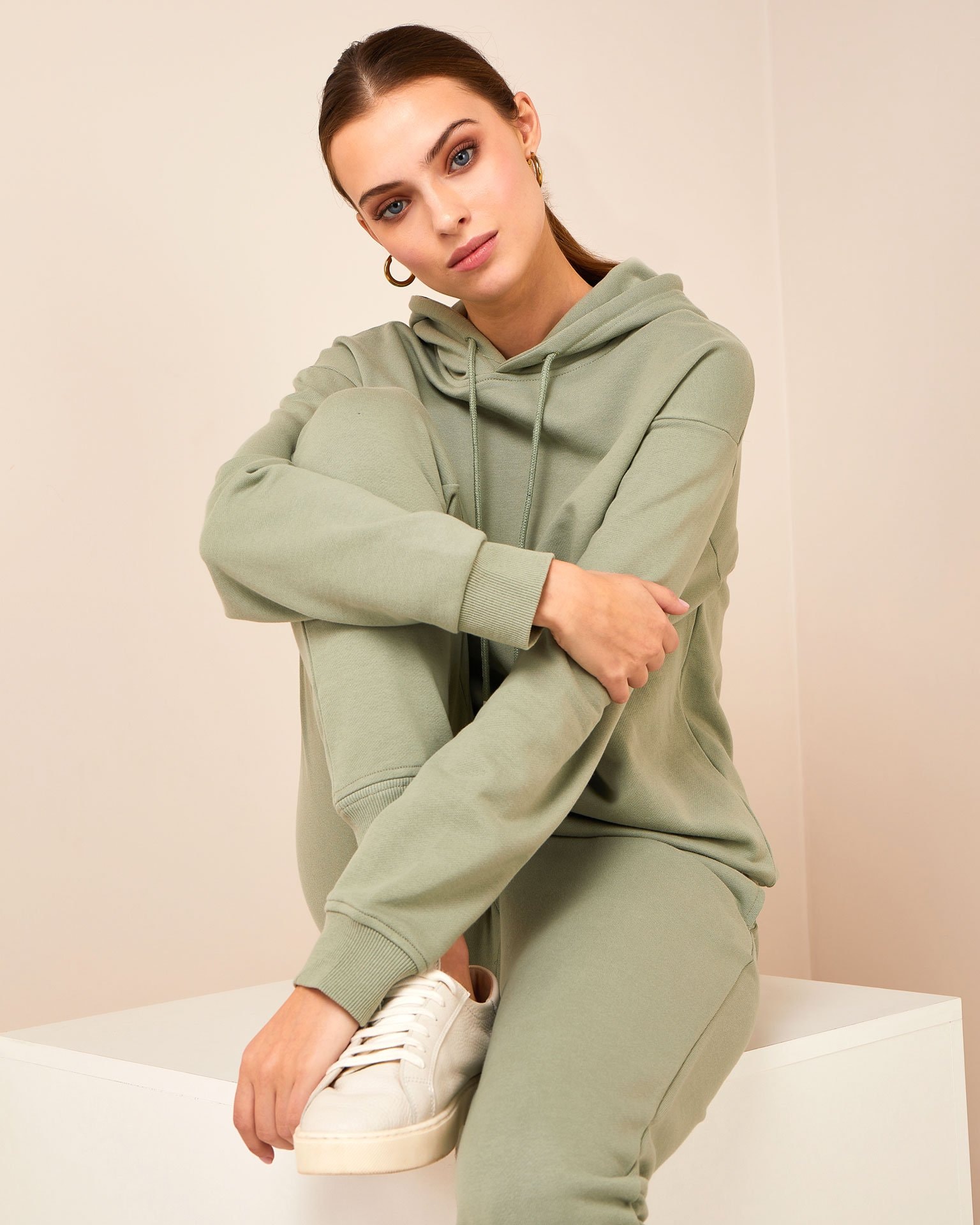 An olive green tracksuit, Olive