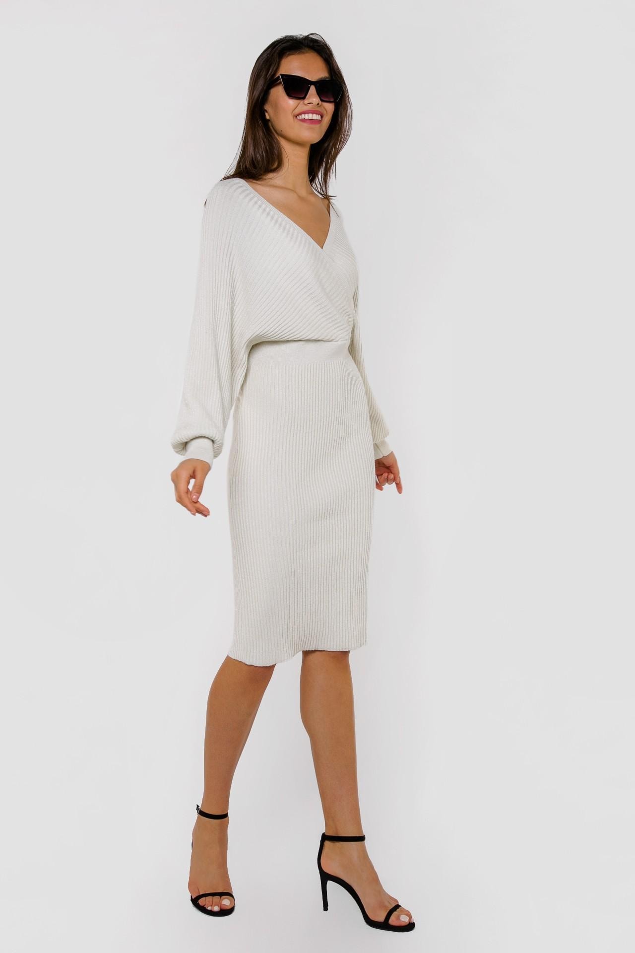 Striking dress with a deep V-neck and batwing sleeves, White