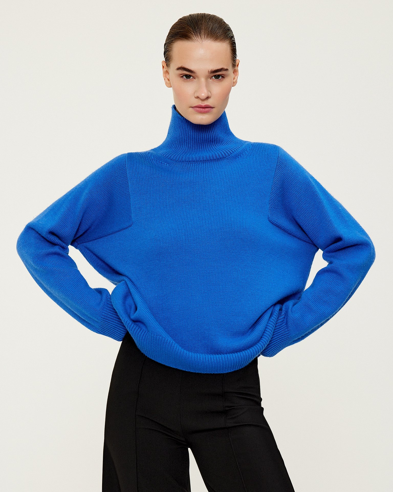 Blue Jumper with a High Collar