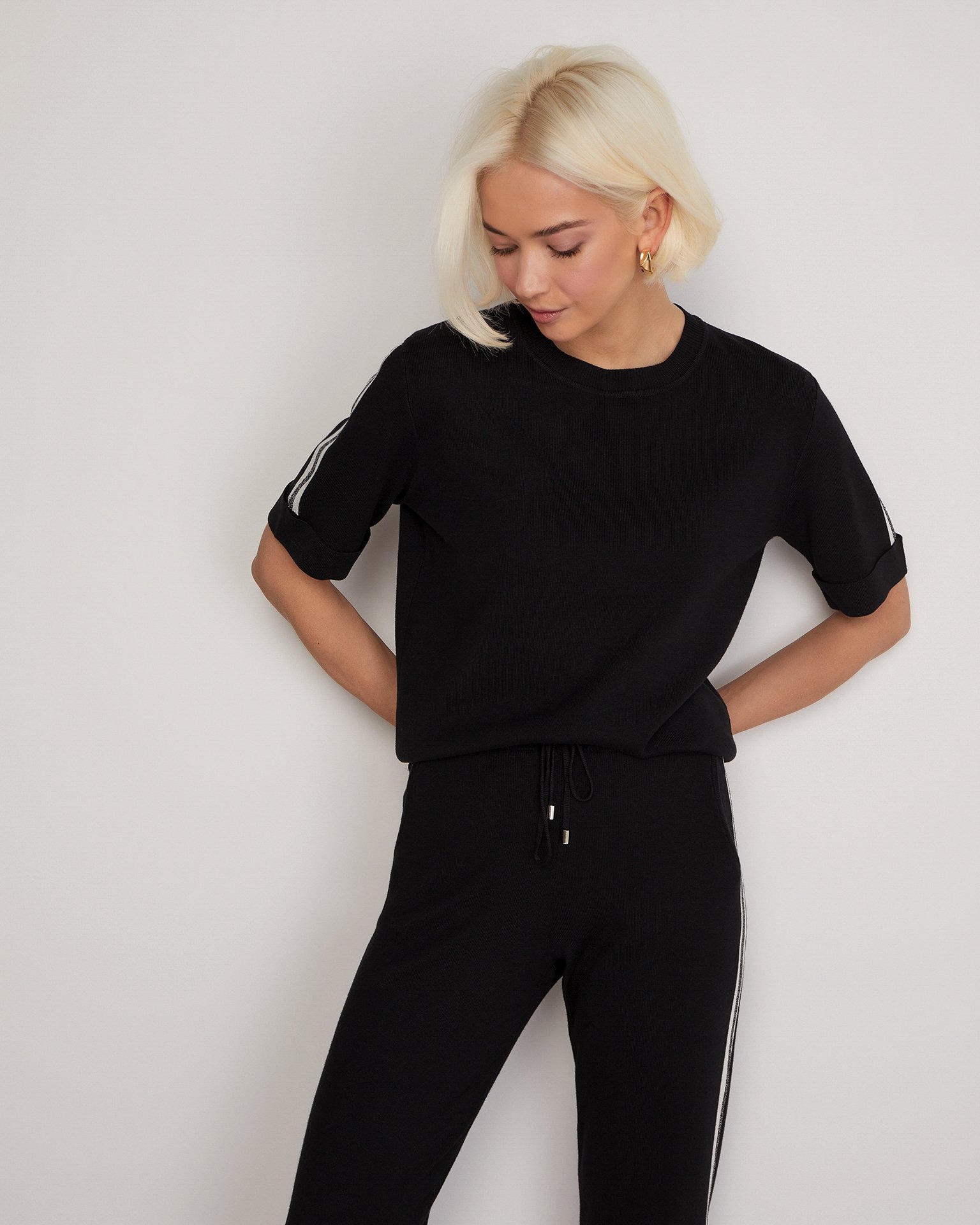 Suit with shimmering stripes