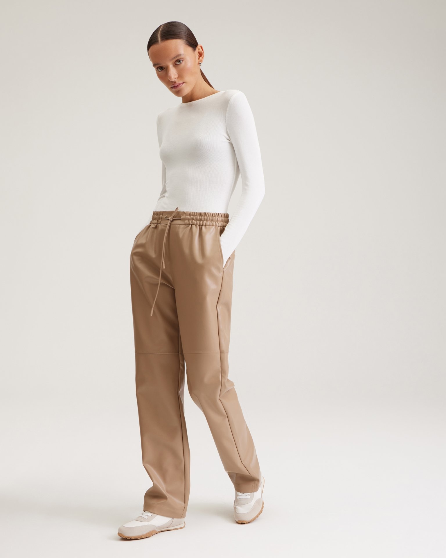 Coffee-coloured faux leather trousers