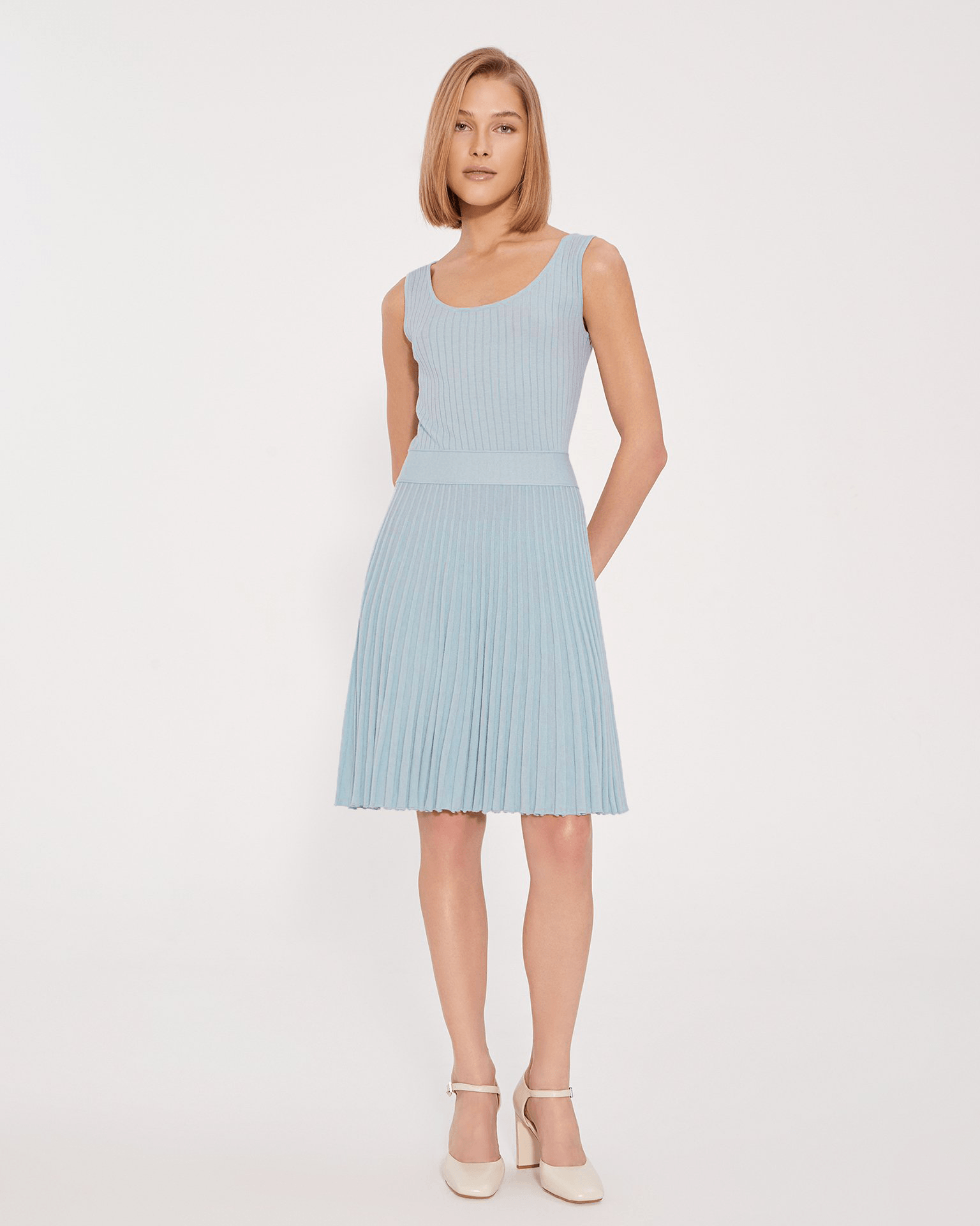 Dress with a pleated skirt