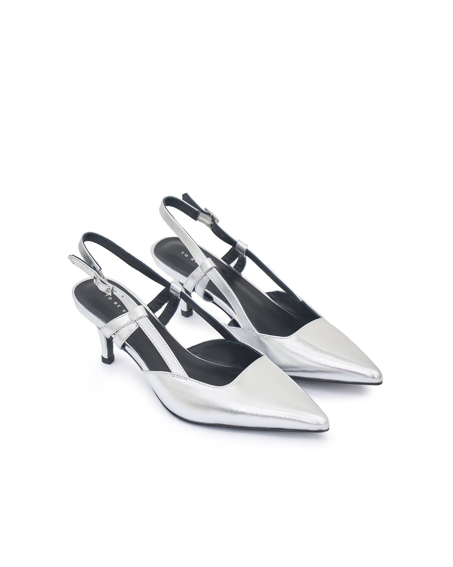 Silver slingback pumps