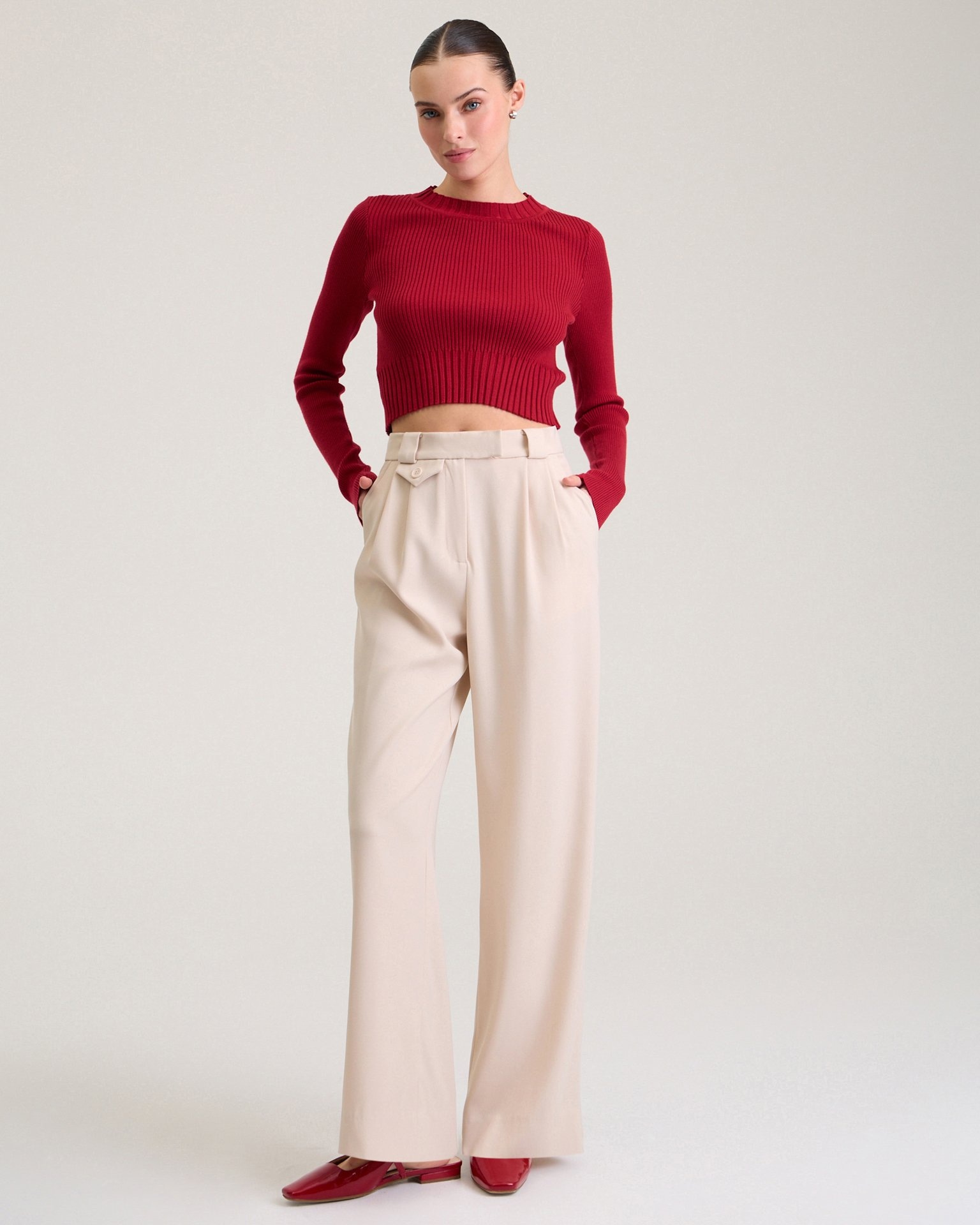 A cropped red jumper