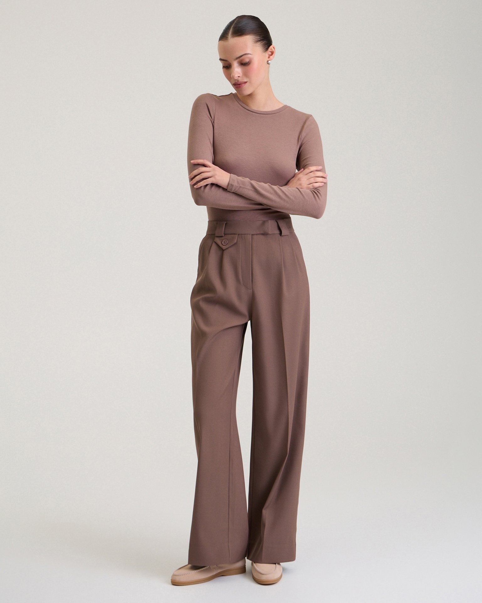 Trousers with decorative pocket in chocolate brown