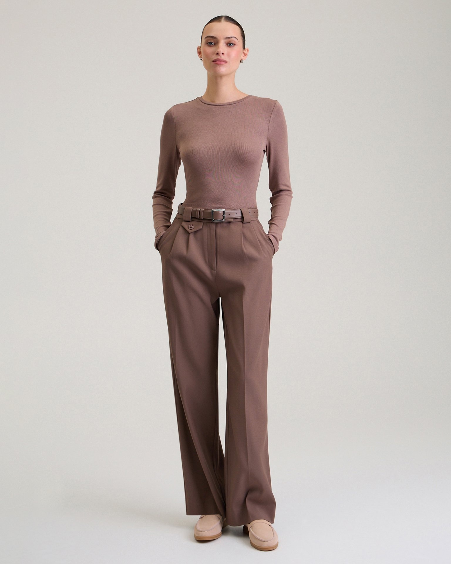 Trousers with decorative pocket in chocolate brown