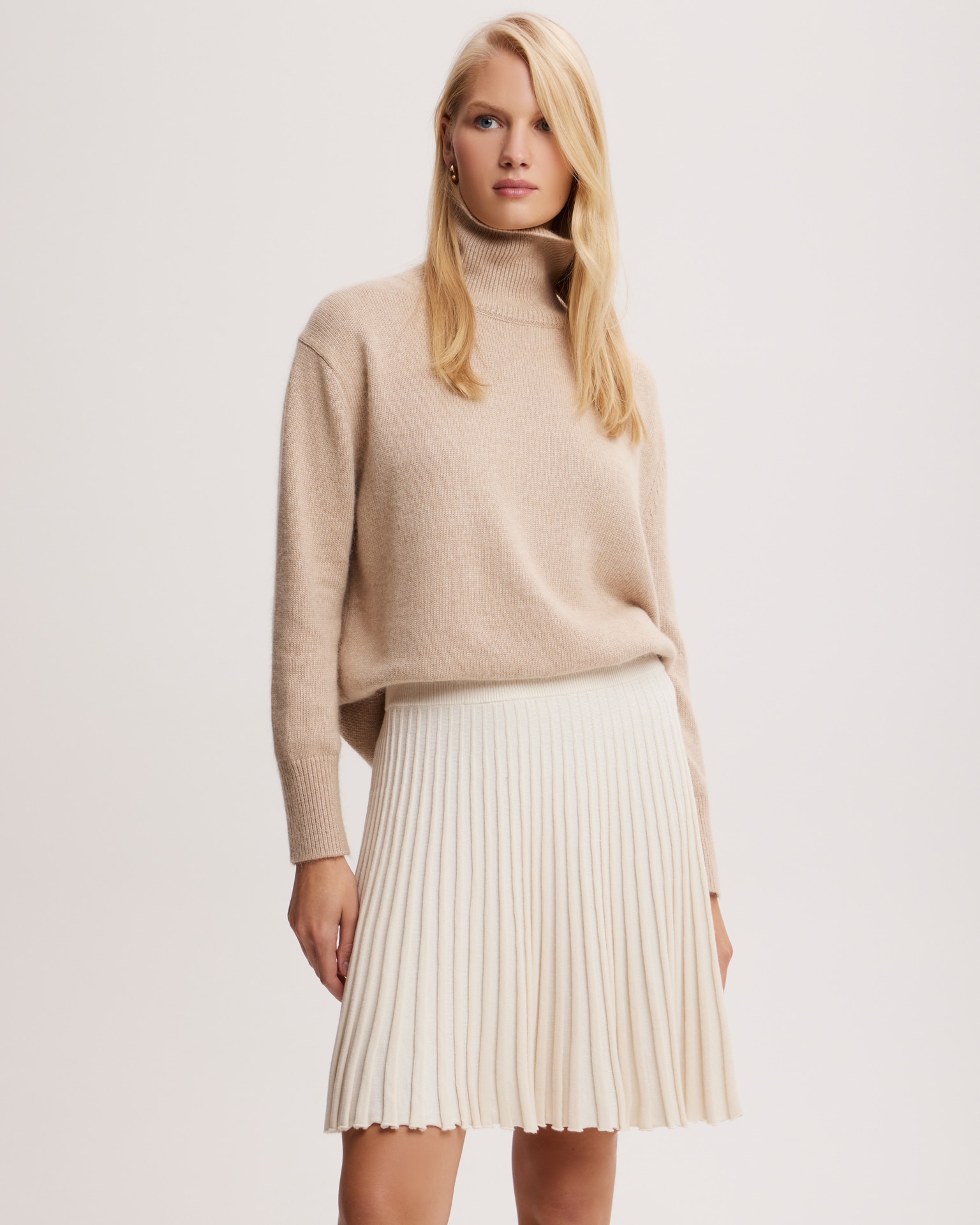 Pleated mini skirt in milk colour