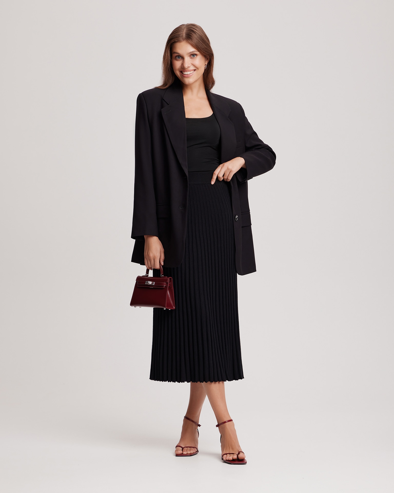 Black pleated midi skirt