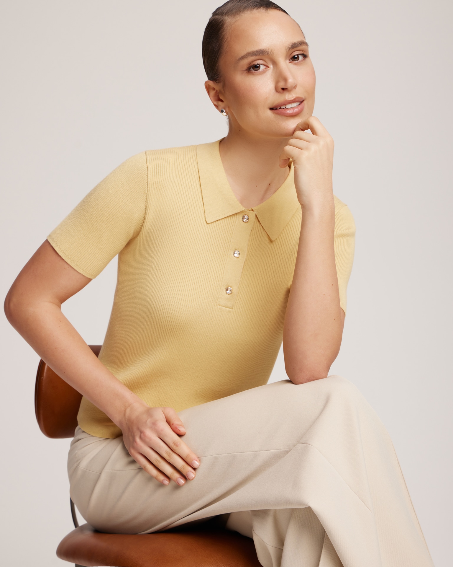 Polo shirt with rhinestone buttons