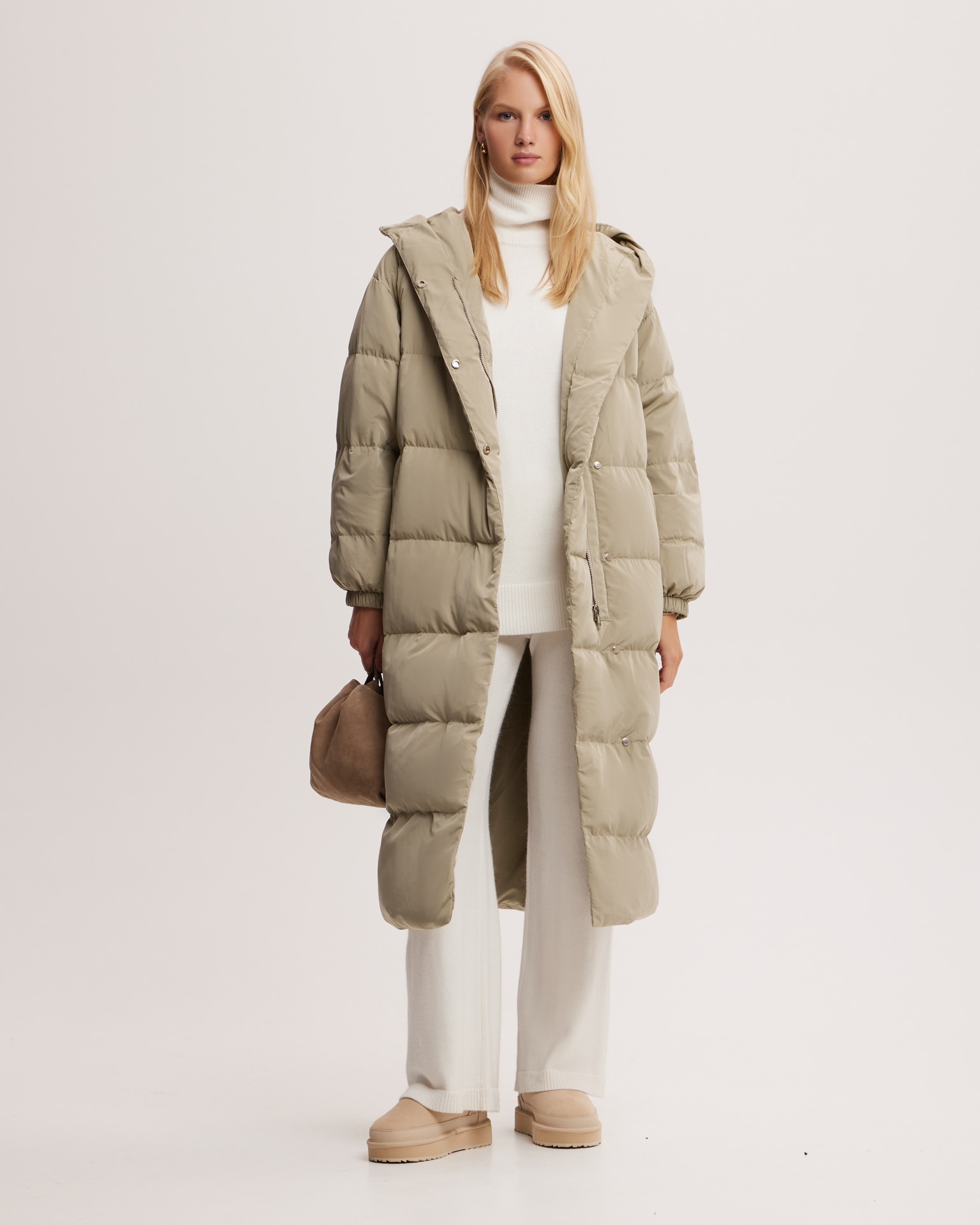 Khaki puffer jacket with snap fasteners