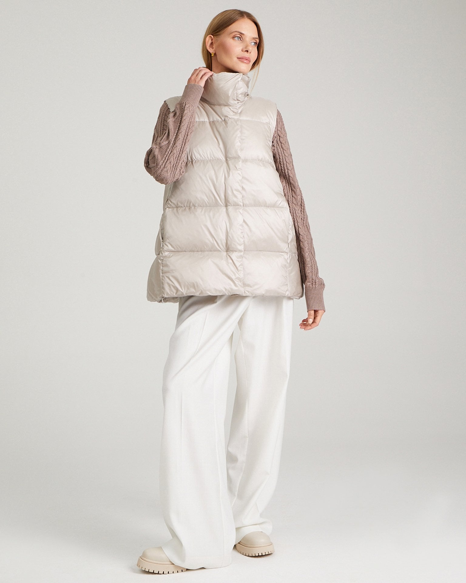 Insulated waistcoat with a stand-up collar