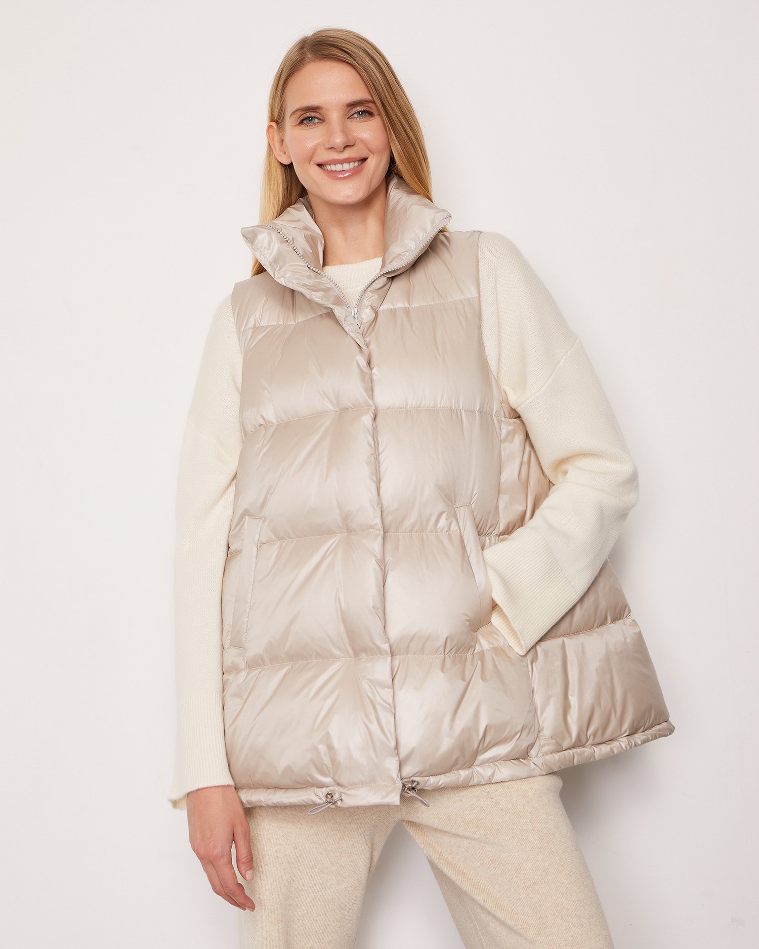 Beige down and feather blend vest