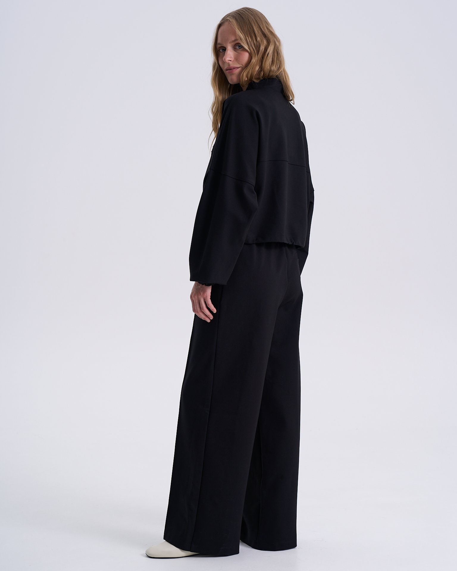 Straight-leg trousers with pressed creases, Black — photo 2