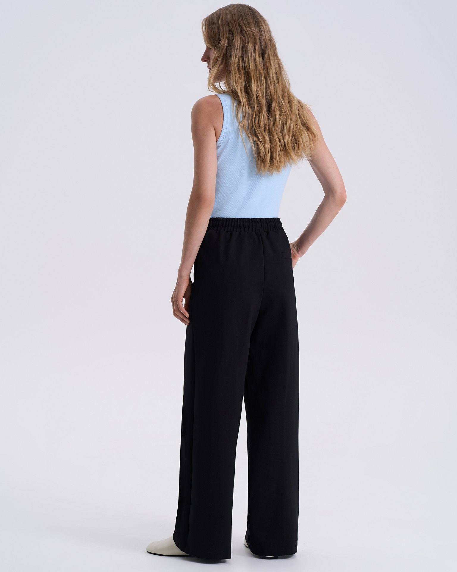 Straight-leg trousers with pressed creases, Black — photo 3