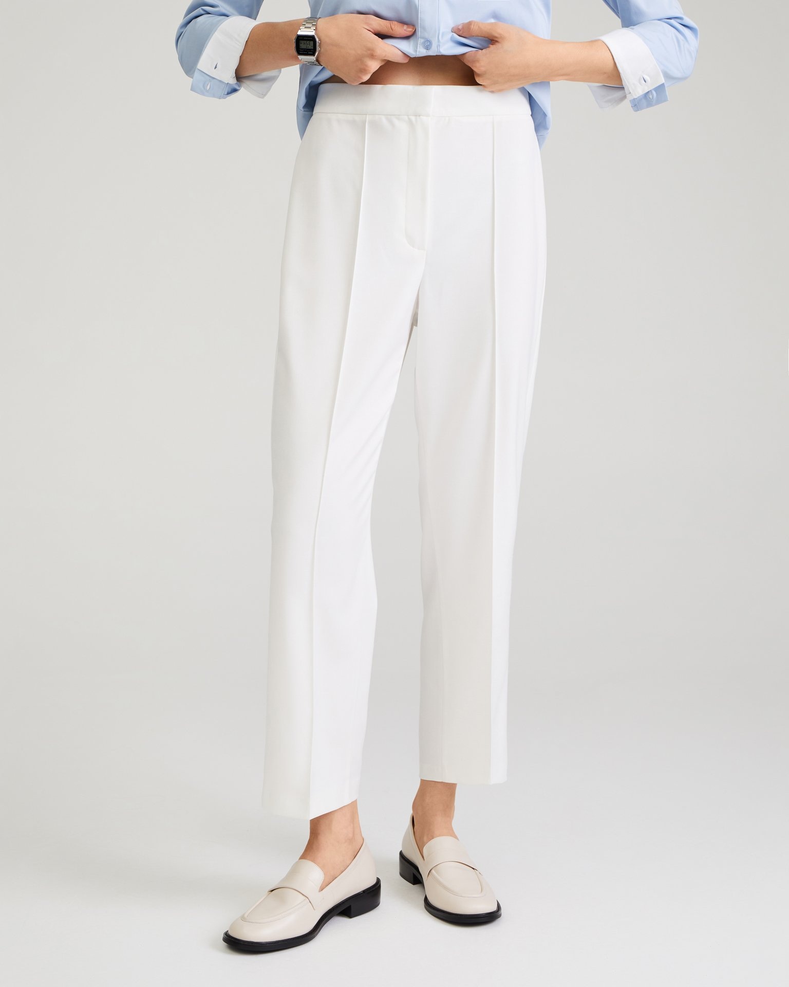 Cropped trousers in milk colour
