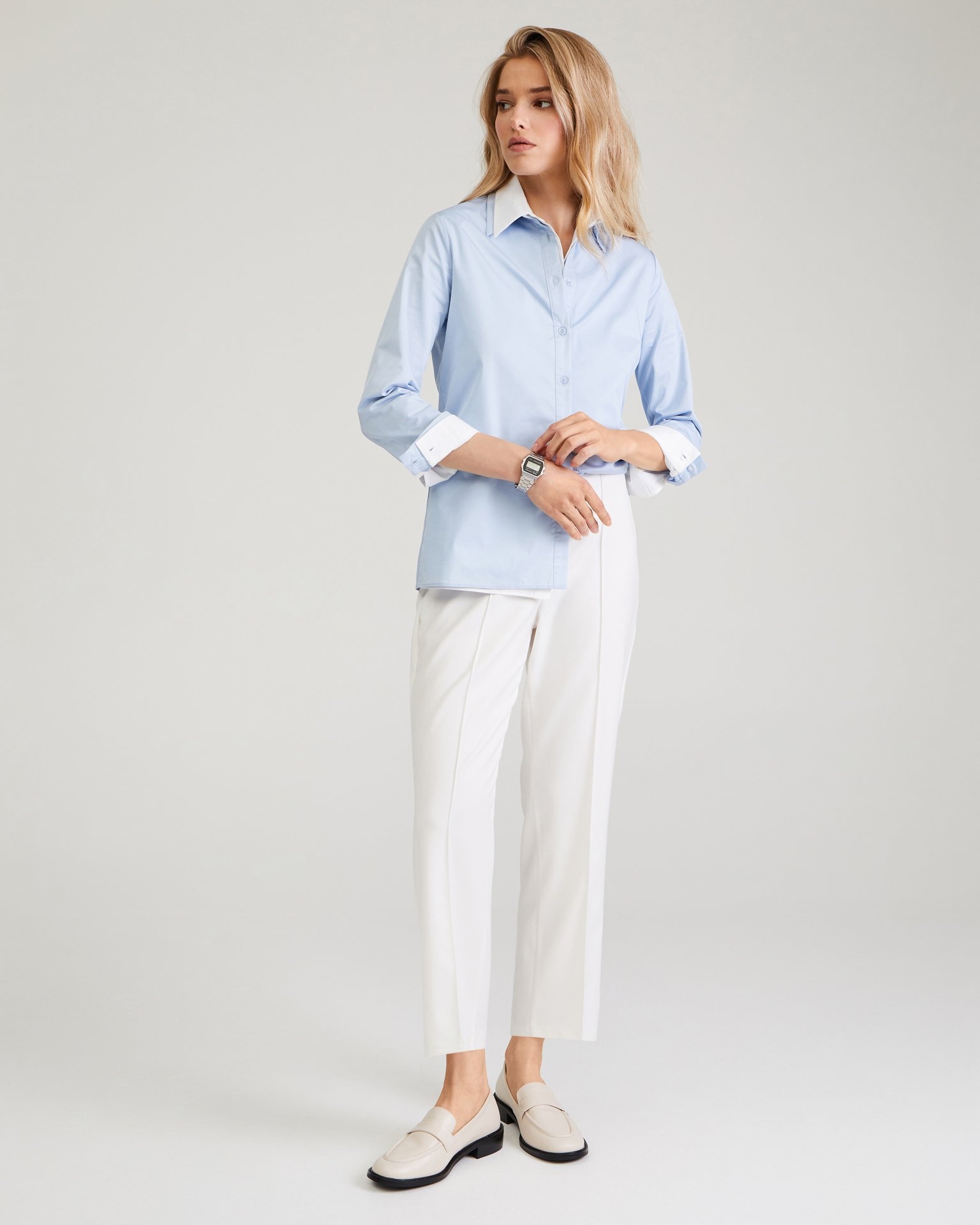 Cropped trousers in milk colour