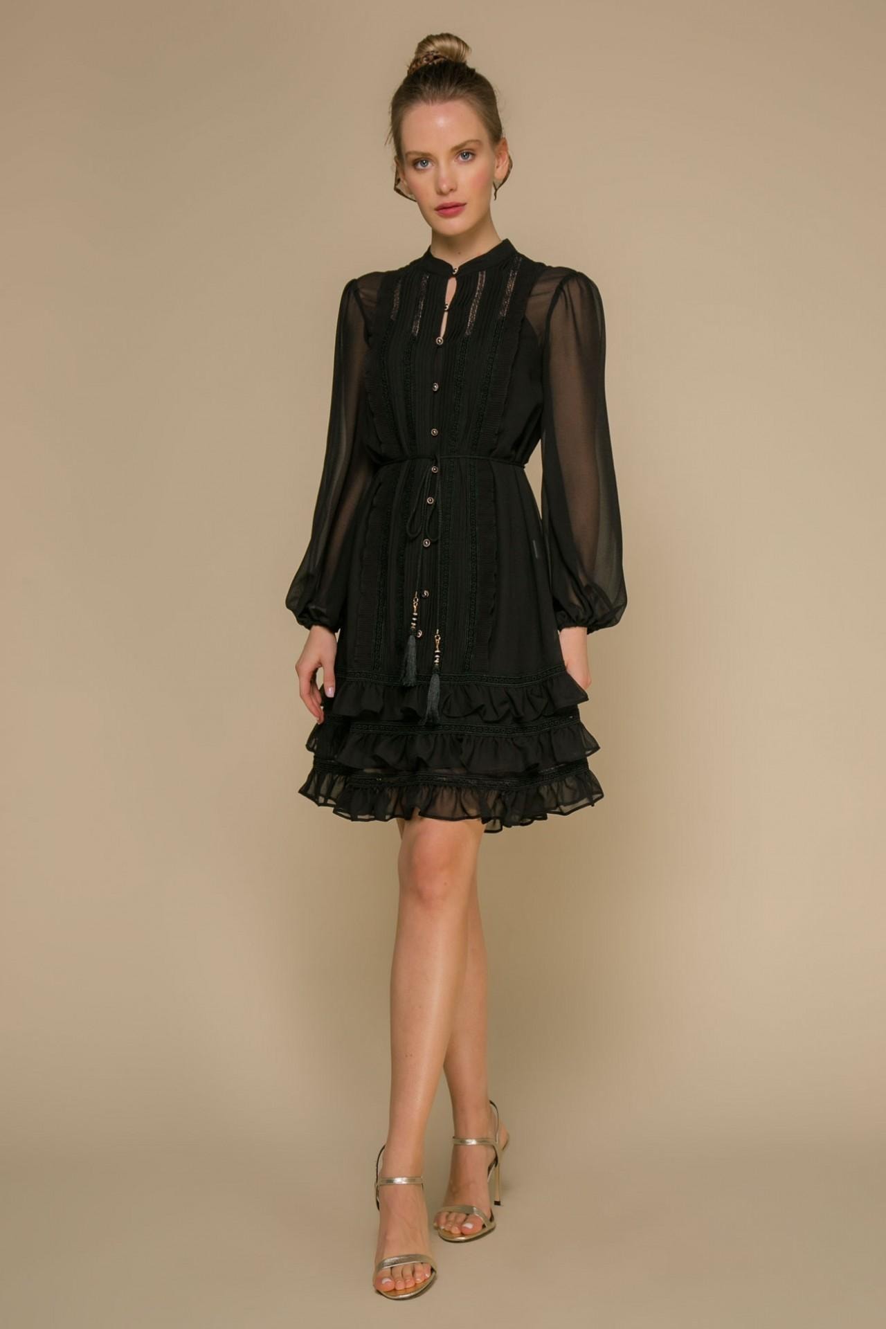 A sleek dress with transparent sleeves and ruffles on the skirt, Black