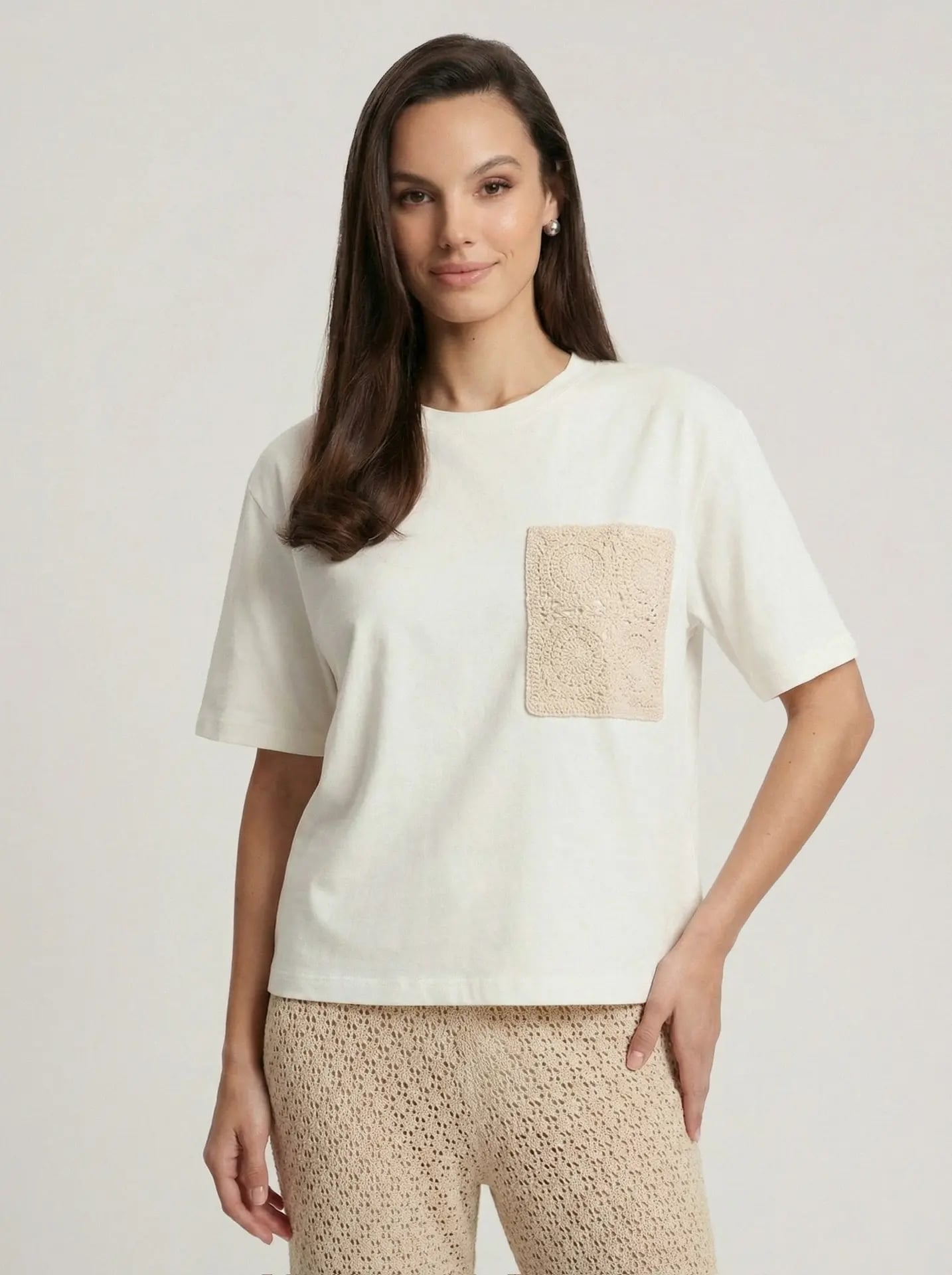 T-shirt with a crochet pocket